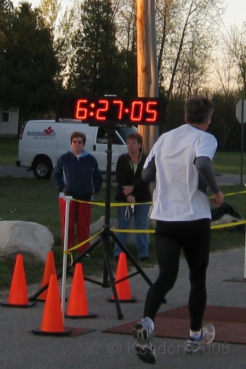 Mackinaw Bridge Race 2008-05 0166.jpg - Must. . .  make . .  it . .  across . . . the . . . scoring . . . mats. . .  to . . . receive . . . . timing....................... after starting about 5:38 or so, made it to the finish by 6:27.